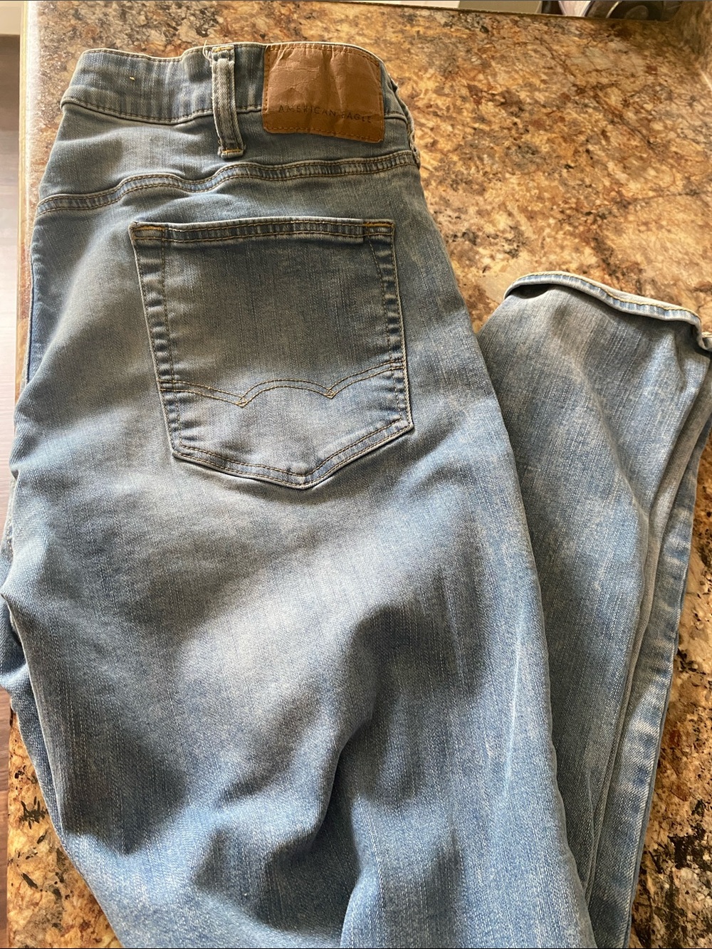 American Eagle Outfitters Light Blue Denim Jeans with Brown Patch